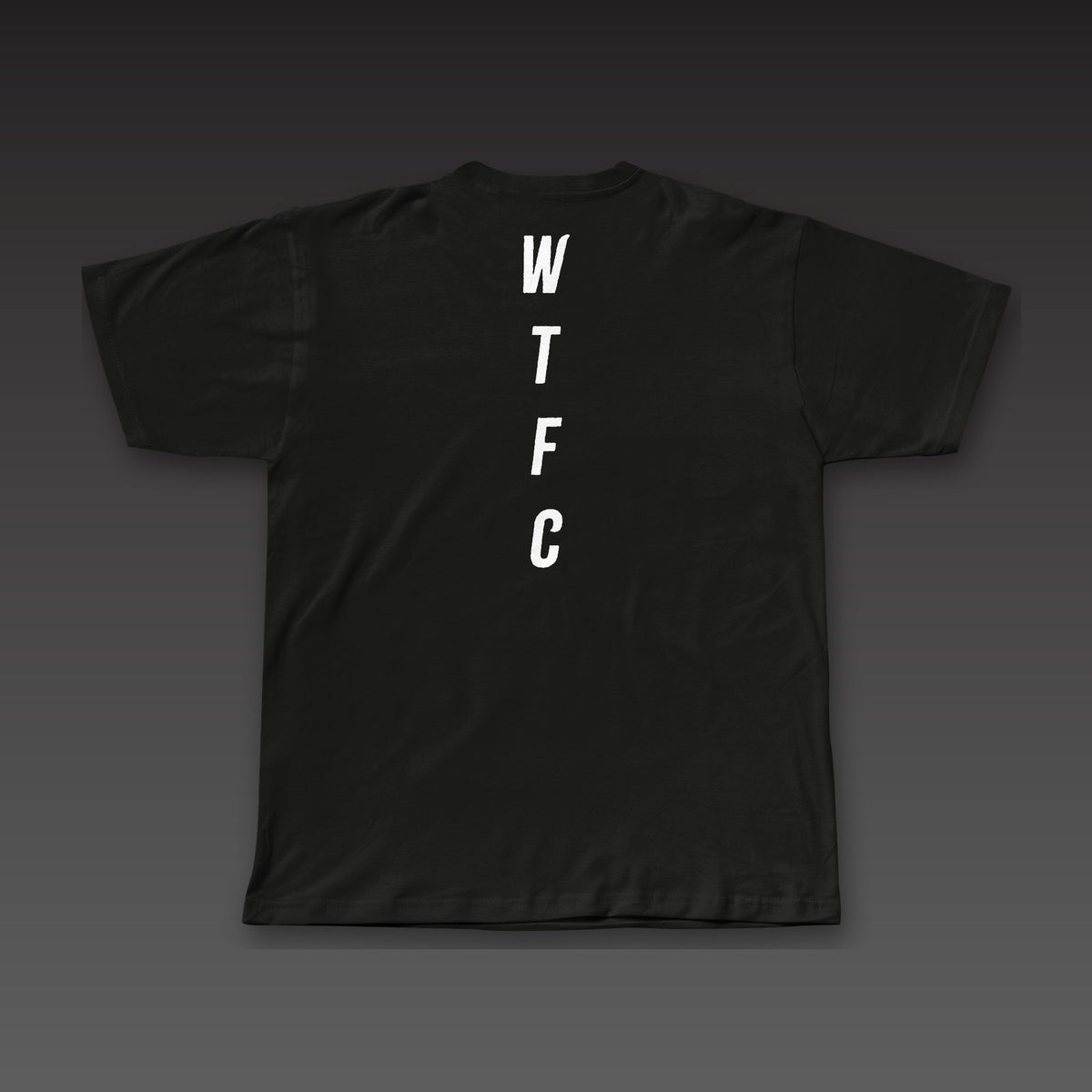Fine Print Tee in black, WTFC running down the back