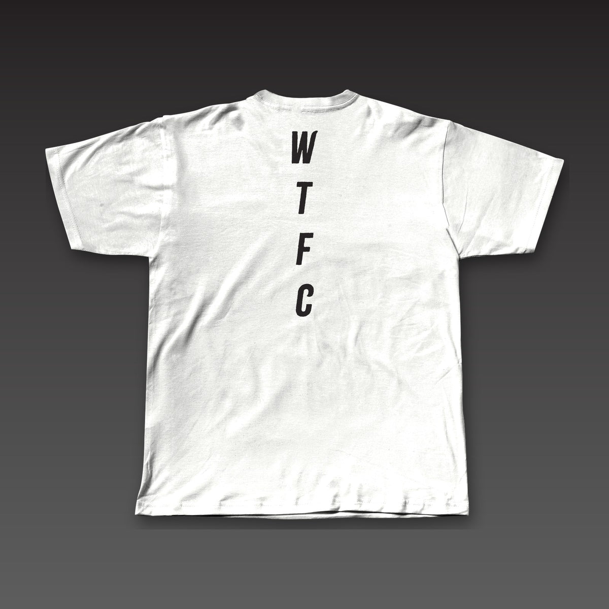 Fine Print Tee in white, WTFC running down the back