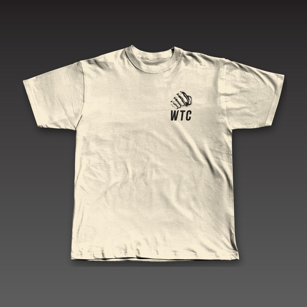 Fist Pocket Tee in oatmeal, a fist over WTC on the left chest