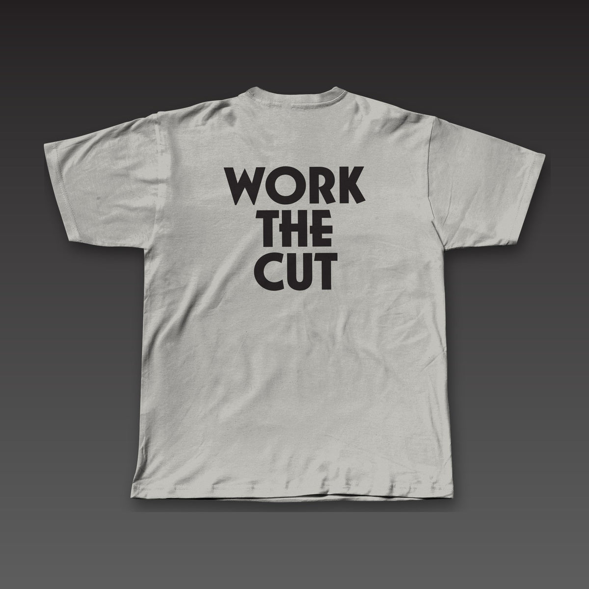 Geometric Tee in athletic grey, Work the Cut stacked in geometric letters across the back