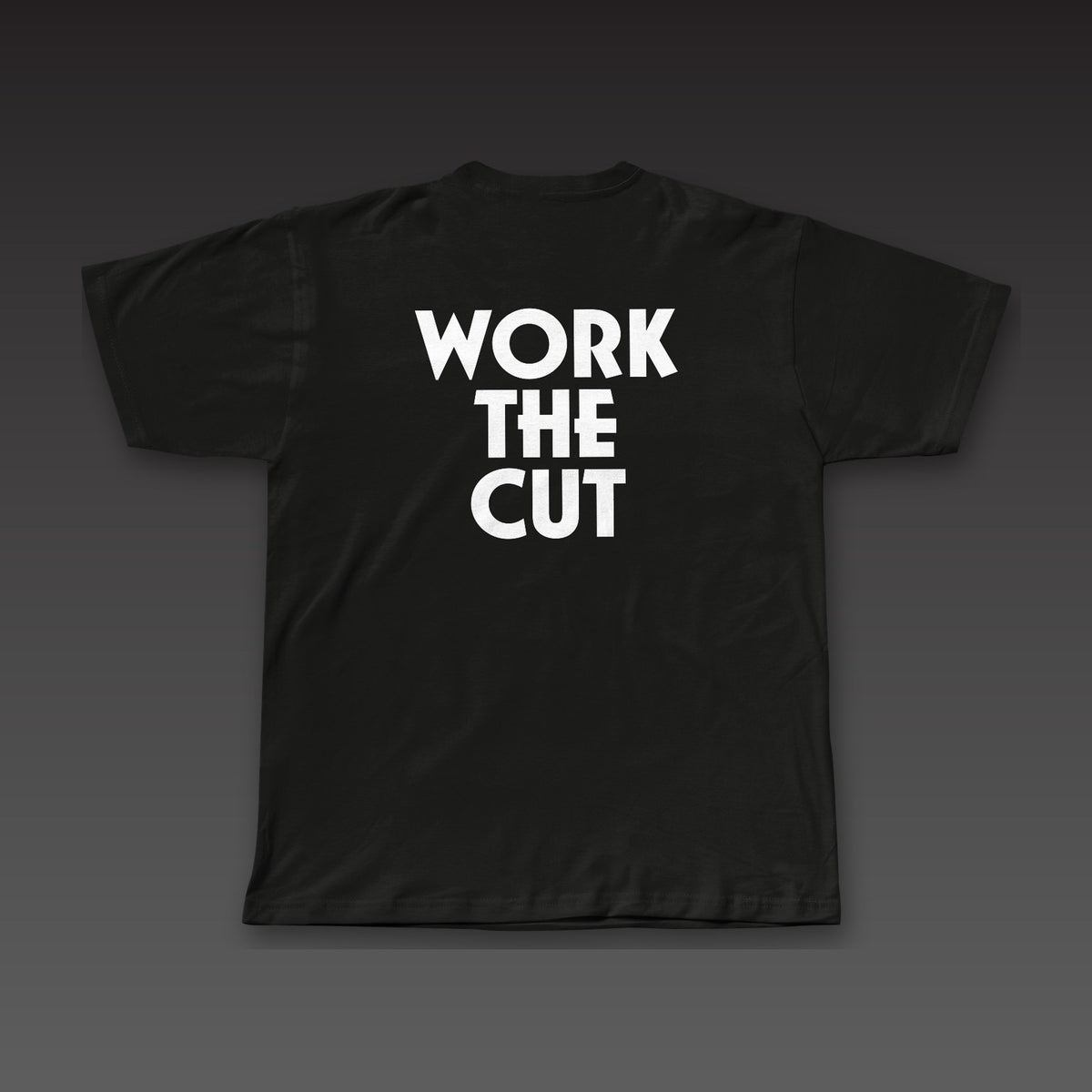 Geometric Tee in black, Work the Cut stacked in geometric letters across the back