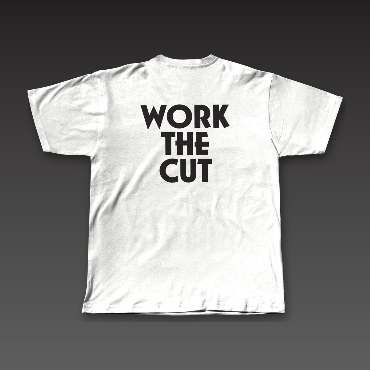 Geometric Tee in white, Work the Cut stacked in geometric letters across the back
