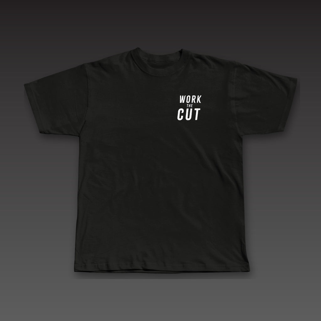 Spine Tee in black, Work the Cut stacked on the left chest
