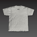 The Climb Tee in athletic grey, a small WTC below the back collar