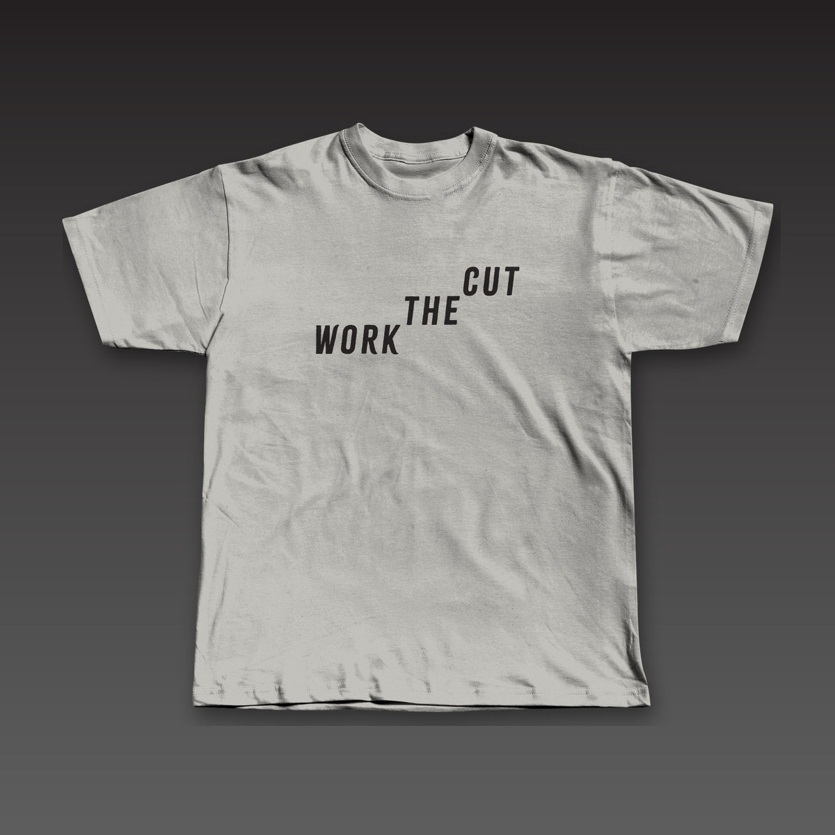 The Climb Tee in athletic grey, Work the Cut climbing up across the chest