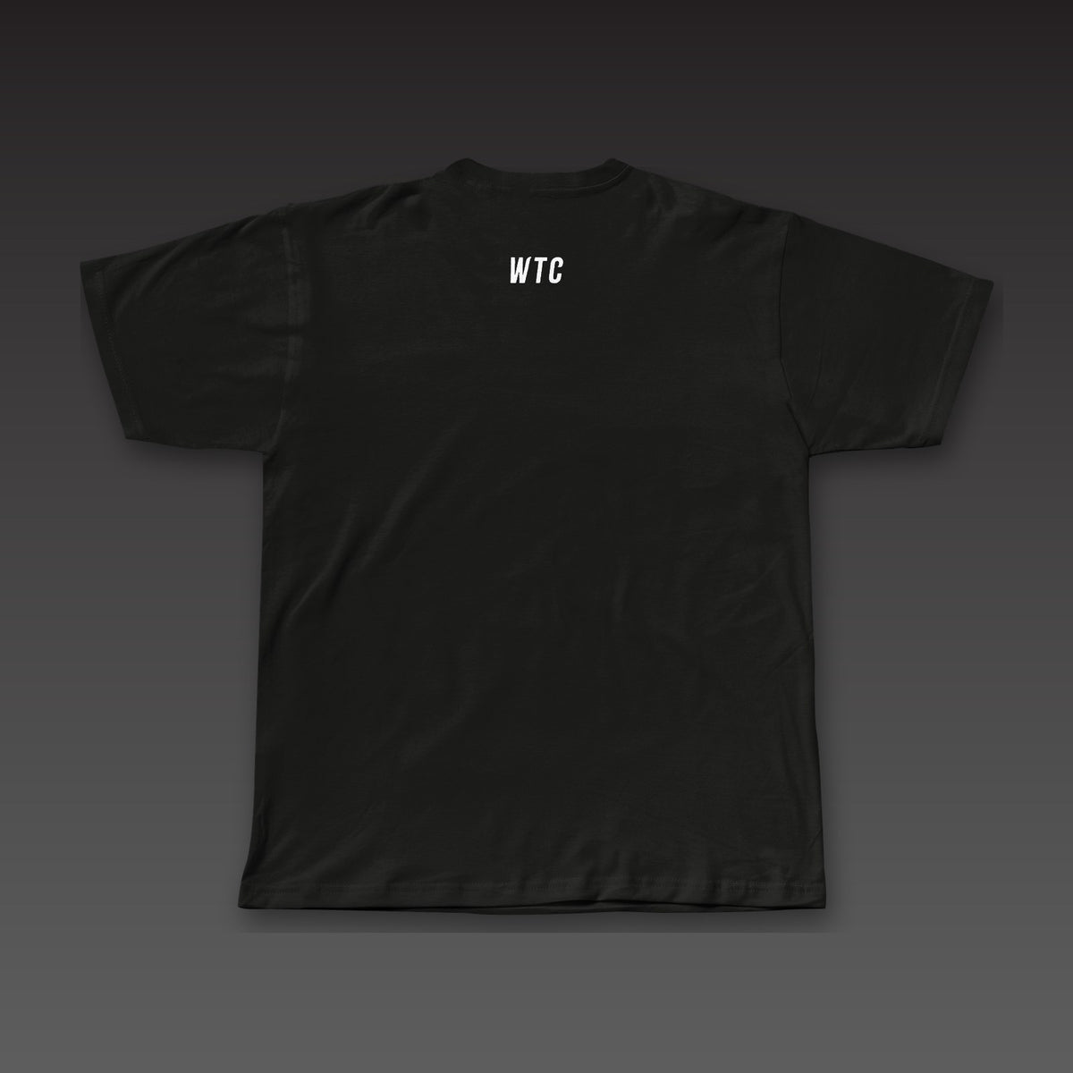 The Climb Tee in black, a small WTC below the back collar