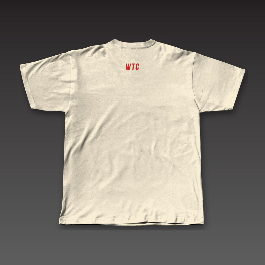 The Climb Tee in oatmeal / red, a small WTC below the back collar