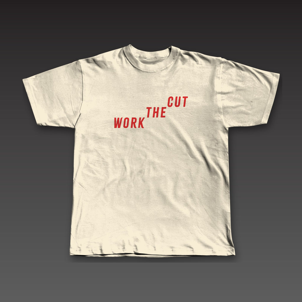The Climb Tee in oatmeal / red, Work the Cut climbing up across the chest