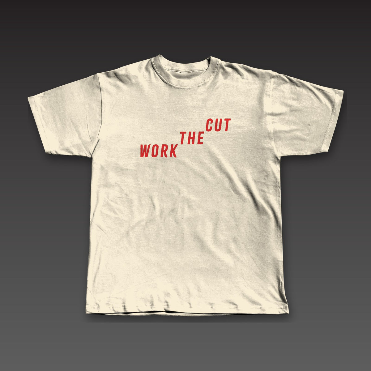 The Climb Tee in oatmeal / red, Work the Cut climbing up across the chest